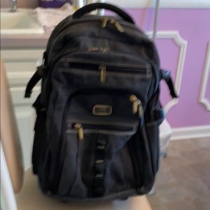 Rothco backpack with wheels and pull out handle